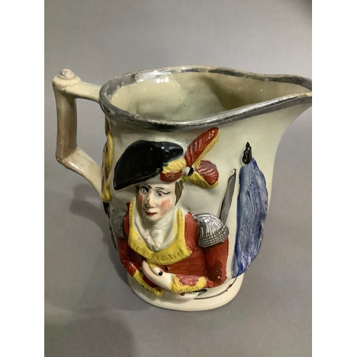 53 - A 19th century Prattware jug painted with Wellington, impressed Marquis Wellington with silver lustr... 