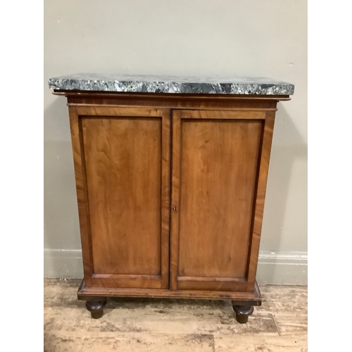 221 - A Victorian marble topped mahogany side cabinet with two indented panel doors on turned feet, 67cm x... 