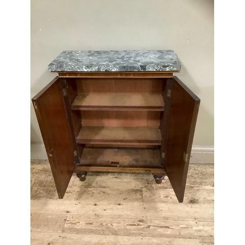 221 - A Victorian marble topped mahogany side cabinet with two indented panel doors on turned feet, 67cm x... 