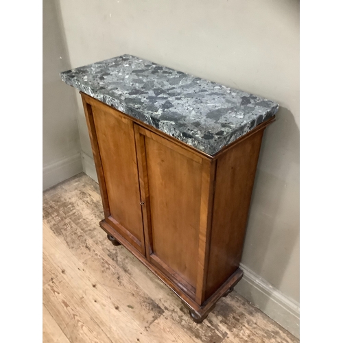 221 - A Victorian marble topped mahogany side cabinet with two indented panel doors on turned feet, 67cm x... 