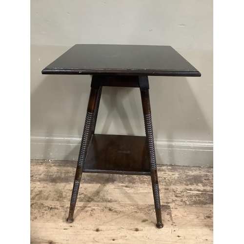 232 - An Arts and Crafts  ebonised occasional table of square outline with turned legs and under tier, 44c... 