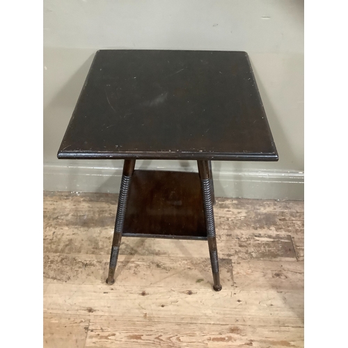 232 - An Arts and Crafts  ebonised occasional table of square outline with turned legs and under tier, 44c... 