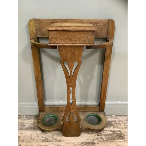 209 - A late Victorian oak hall stand having a glove box with hinged lid and drip trays (reduced) 61cm wid... 