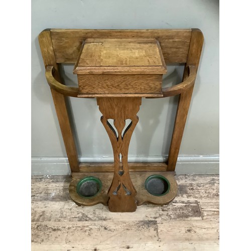 209 - A late Victorian oak hall stand having a glove box with hinged lid and drip trays (reduced) 61cm wid... 