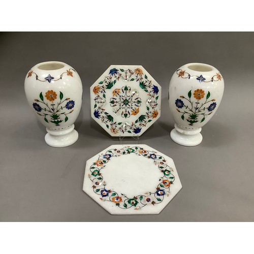 12B - A pair of white marble pietra dura vases, the ovoid body inlaid with lapis lazuli, malachite and oth... 