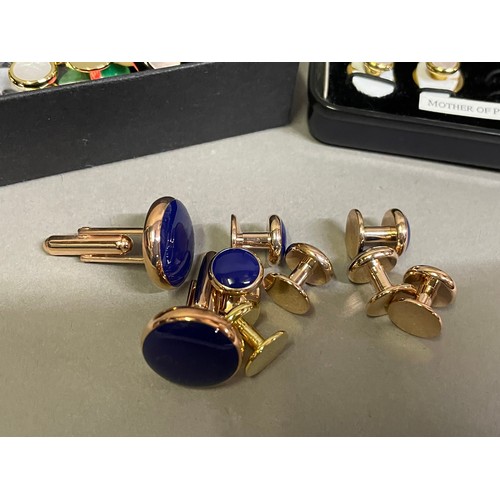 173 - A collection of three dress sets each of cufflinks and shirt studs in gilt and rose base metal vario... 