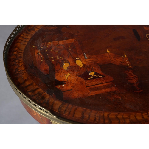 418 - A FRENCH CHINOISERIE MAHOGANY AND GILT METAL MOUNTED TABLE of oval outline with three quarter galler... 