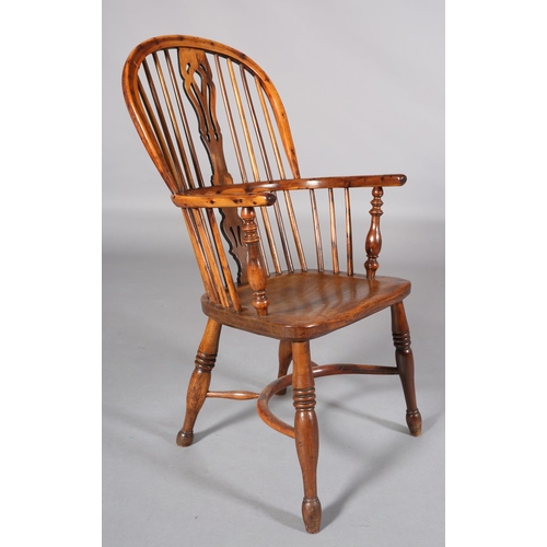 365 - A LATE 18TH CENTURY YEW-WOOD WINDSOR ARMCHAIR, having a pierced splat and rail back, elm seat, turne... 