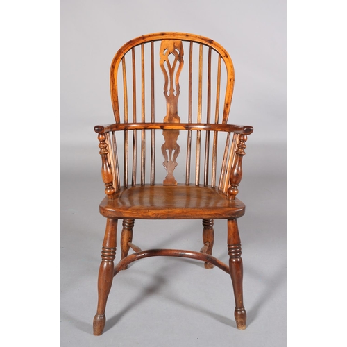 365 - A LATE 18TH CENTURY YEW-WOOD WINDSOR ARMCHAIR, having a pierced splat and rail back, elm seat, turne... 