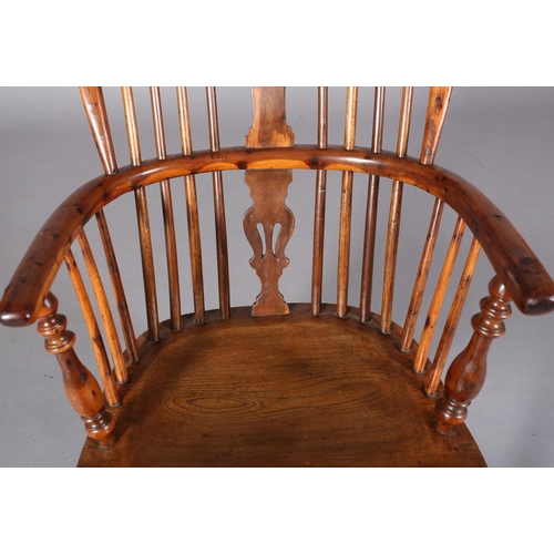 365 - A LATE 18TH CENTURY YEW-WOOD WINDSOR ARMCHAIR, having a pierced splat and rail back, elm seat, turne... 