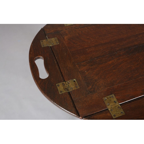 366 - AN OAK AND BRASS BUTLER'S TRAY, oval hinged sides with finger grips, on a folding stand, c.1920s, 81... 