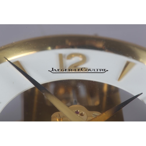 47 - A JAEGER-LE COULTRE ATMOS CLOCK in rectangular five light case, circular white dial with gilt Arabic... 