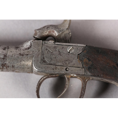 8 - A 19TH CENTURY POCKET PISTOL BY H NOCK LONDON, with percussion engraved lock, turn off barrel, slab ... 