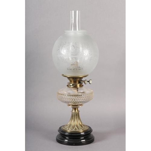 40 - A VICTORIAN BRASS OIL LAMP, slice cut clear glass reservoir, globular opaque glass shade etched with... 