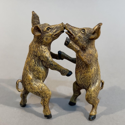 59 - FRANZ BERGMAN, AUSTRIA C1900, a cold painted bronze group of two dancing pigs, marked to inner hind ... 