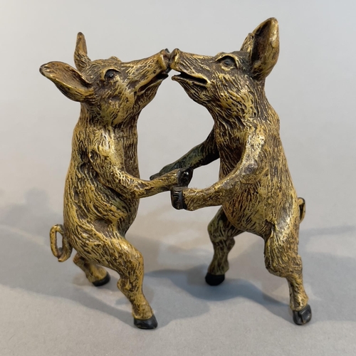 59 - FRANZ BERGMAN, AUSTRIA C1900, a cold painted bronze group of two dancing pigs, marked to inner hind ... 