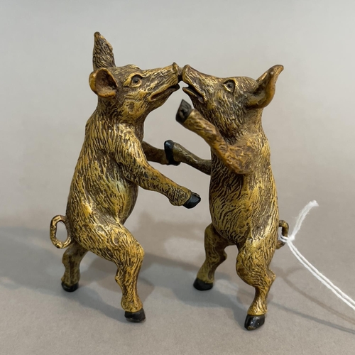 59 - FRANZ BERGMAN, AUSTRIA C1900, a cold painted bronze group of two dancing pigs, marked to inner hind ... 