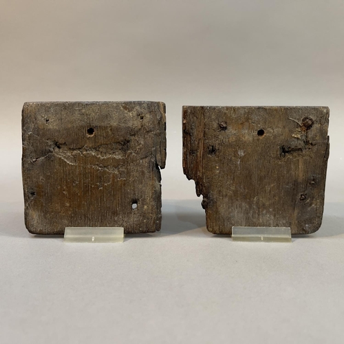 66 - A PAIR OF 18TH CENTURY OAK ANGLE BRACKETS CARVED AS A LION FACE MASK AND GREEN MAN FACE MASK, each w... 