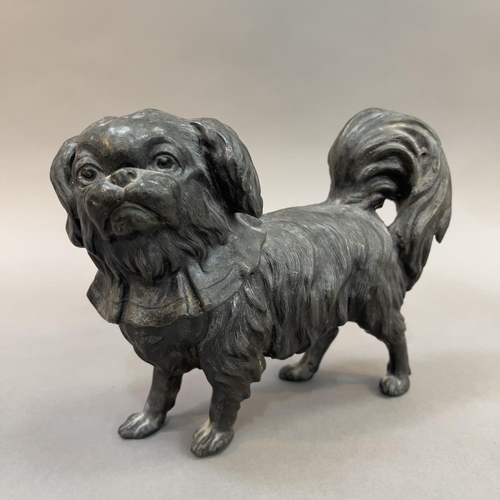 55 - A 19TH CENTURY PEWTER FIGURE OF A PEKINGESE DOG, 20cm long x 16cm high (Shipping category D)