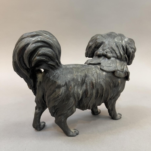 55 - A 19TH CENTURY PEWTER FIGURE OF A PEKINGESE DOG, 20cm long x 16cm high (Shipping category D)