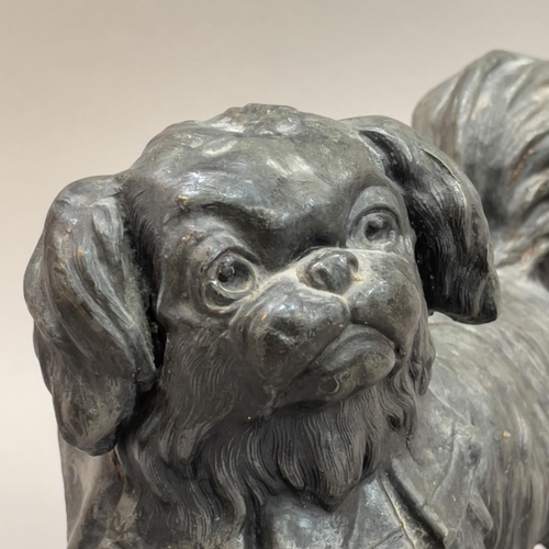 55 - A 19TH CENTURY PEWTER FIGURE OF A PEKINGESE DOG, 20cm long x 16cm high (Shipping category D)