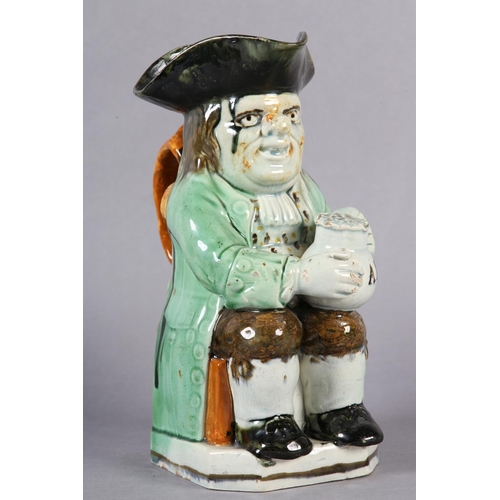 80 - AA RALPH WOOD TYPE PEARLWARE TOBY JUG C1790-1800 of typical form, glazed in green, brown and umber, ... 