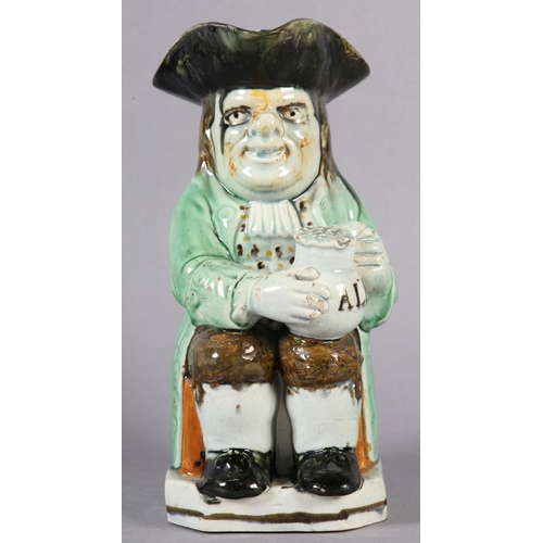 80 - AA RALPH WOOD TYPE PEARLWARE TOBY JUG C1790-1800 of typical form, glazed in green, brown and umber, ... 