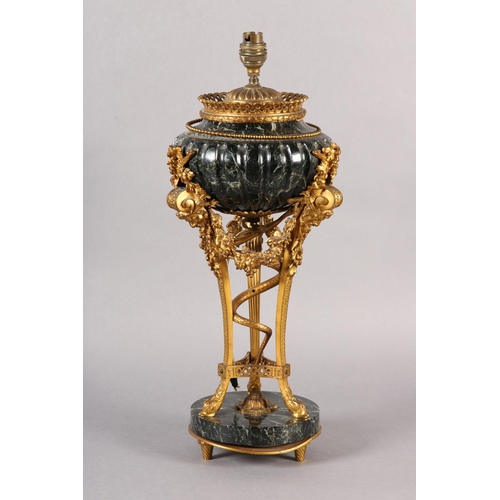 43 - A FRENCH DARK GREEN MARBLE AND GILT METAL TABLE LAMP, raised on three legs with bearded face mask pa... 