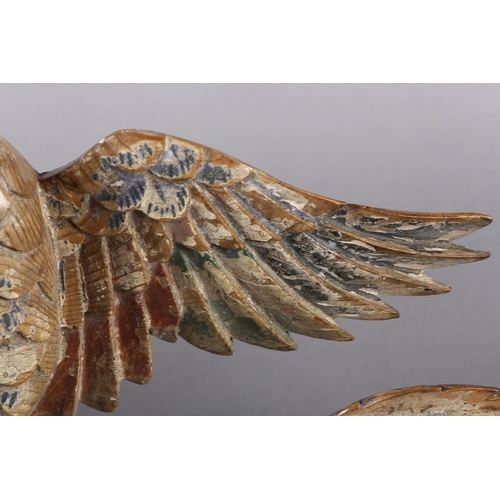 115 - AN 18TH/EARLY 19TH CENTURY POLYCHROME PAINTED PINE CARVING OF A PHOENIX AMONGST CLOUDS, 58cm wide x ... 