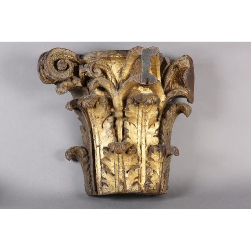 63 - AN 18TH CENTURY GILDED OAK CAPITOL, carved with acanthus and scrollwork, 39cm high x 42cm wide (Ship... 