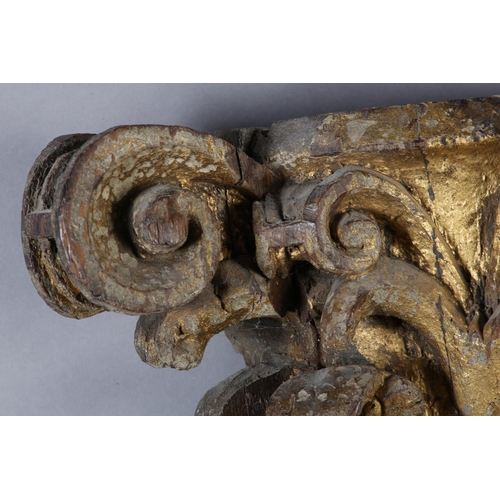 63 - AN 18TH CENTURY GILDED OAK CAPITOL, carved with acanthus and scrollwork, 39cm high x 42cm wide (Ship... 