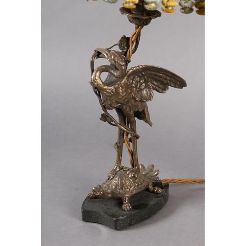 38 - A PAIR OF EPNS TABLE LAMPS IN THE FORM OF A CRANE PERCHED ON THE BACK OF A TURTLE, on black marble p... 