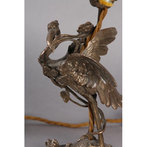 38 - A PAIR OF EPNS TABLE LAMPS IN THE FORM OF A CRANE PERCHED ON THE BACK OF A TURTLE, on black marble p... 