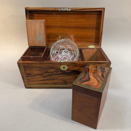 74 - A COROMANDEL WOOD AND BRASS INLAID TEA CADDY, early 19th century, of sarcophagus form with lion mask... 