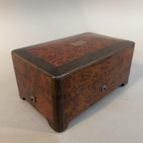 52 - A BURR WALNUT AND CROSSBANDED MUSICAL BOX, early 20th century, playing six airs, the wind-up movemen... 