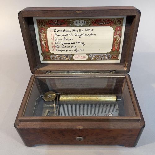 52 - A BURR WALNUT AND CROSSBANDED MUSICAL BOX, early 20th century, playing six airs, the wind-up movemen... 