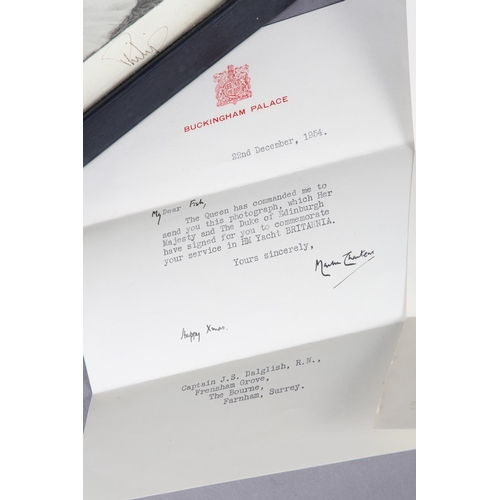 2 - QUEEN ELIZABETH II AND PHILIP, DUKE OF EDINBURGH, a signed photograph dated 1954, in dark blue leath... 