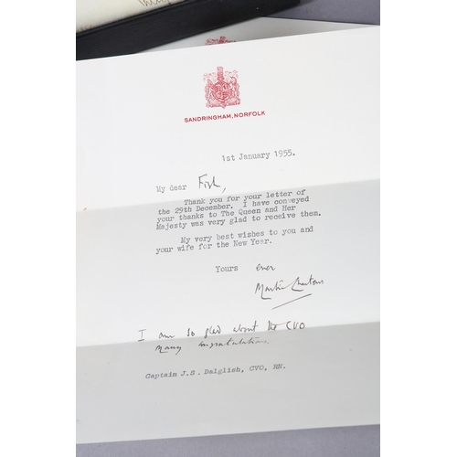 2 - QUEEN ELIZABETH II AND PHILIP, DUKE OF EDINBURGH, a signed photograph dated 1954, in dark blue leath... 