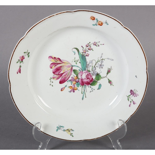 98 - AN 18TH CENTURY HOCHST PORCELAIN PLATE, polychrome painted with tulip, peony and other blossom, brow... 