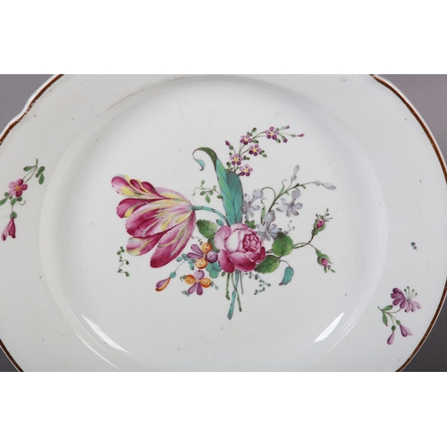 98 - AN 18TH CENTURY HOCHST PORCELAIN PLATE, polychrome painted with tulip, peony and other blossom, brow... 