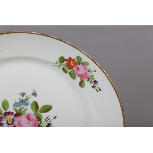 99 - A LATE 18TH CENTURY EUROPEAN PORCELAIN PLATE, polychrome painted with peony and other blossom to the... 