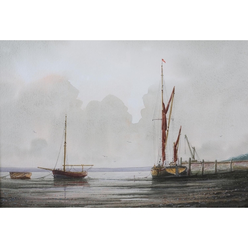 318 - ARR ALAN WHITEHEAD (b.1952), Fishing boat and sailing dinghy at low tide, watercolour, signed to low... 