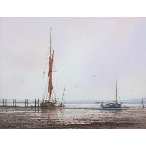 318 - ARR ALAN WHITEHEAD (b.1952), Fishing boat and sailing dinghy at low tide, watercolour, signed to low... 