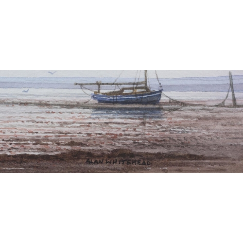 318 - ARR ALAN WHITEHEAD (b.1952), Fishing boat and sailing dinghy at low tide, watercolour, signed to low... 