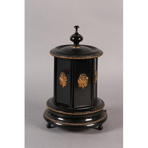 71 - A 19TH CENTURY FRENCH EBONISED AND GILT METAL MOUNTED MUSICAL WORK CAROUSEL PLAYING TWO AIRS, the tu... 