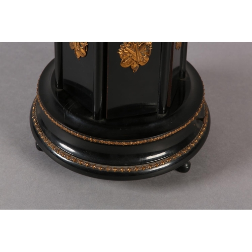 71 - A 19TH CENTURY FRENCH EBONISED AND GILT METAL MOUNTED MUSICAL WORK CAROUSEL PLAYING TWO AIRS, the tu... 