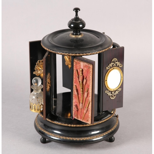 71 - A 19TH CENTURY FRENCH EBONISED AND GILT METAL MOUNTED MUSICAL WORK CAROUSEL PLAYING TWO AIRS, the tu... 