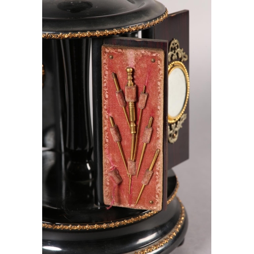 71 - A 19TH CENTURY FRENCH EBONISED AND GILT METAL MOUNTED MUSICAL WORK CAROUSEL PLAYING TWO AIRS, the tu... 