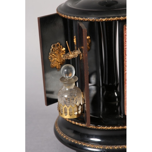 71 - A 19TH CENTURY FRENCH EBONISED AND GILT METAL MOUNTED MUSICAL WORK CAROUSEL PLAYING TWO AIRS, the tu... 