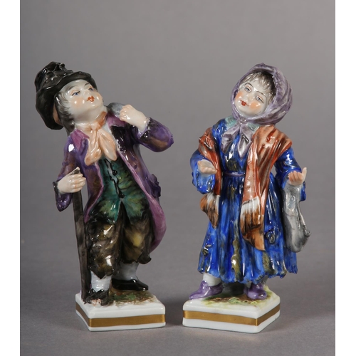 101 - A PAIR OF LATE 19TH/EARLY 20TH CENTURY, GERMAN PORCELAIN FIGURES of begging children, a girl with he... 